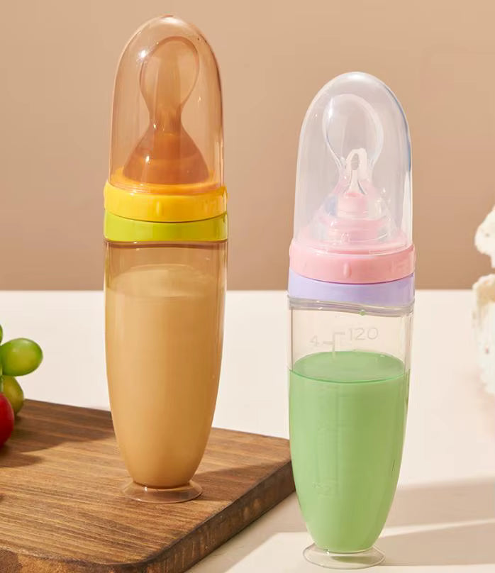 Baby Bottle With Spoon